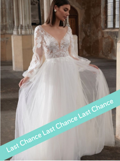 Robe de mariée longue style princesse, manches longues, perles et sequins