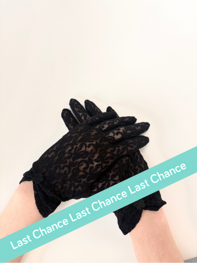 Gants noir en tulle avec fronce, l'accessoire idéal pour sublimer votre tenue.