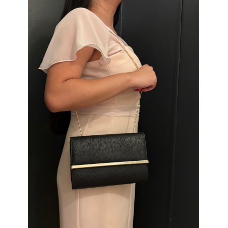 Sac de soirée à porter à la main ou en bandoulière. Noir et doré, très chic, en simili-cuir.
