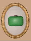 Sac de soirée à porter à la main ou en bandoulière. Vert et argenté, très chic, en simili-cuir.