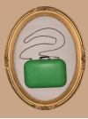 Sac de soirée à porter à la main ou en bandoulière. Vert et argenté, très chic, en simili-cuir.