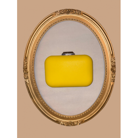 Sac de soirée à porter à la main ou en bandoulière. Jaune et argenté, très chic, en simili-cuir.