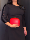 Sac de soirée à porter à la main ou en bandoulière. Rouge et doré, très chic, en simili-cuir.