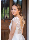 Bathilde, robe courte, jupe patineuse , dos nu profond.